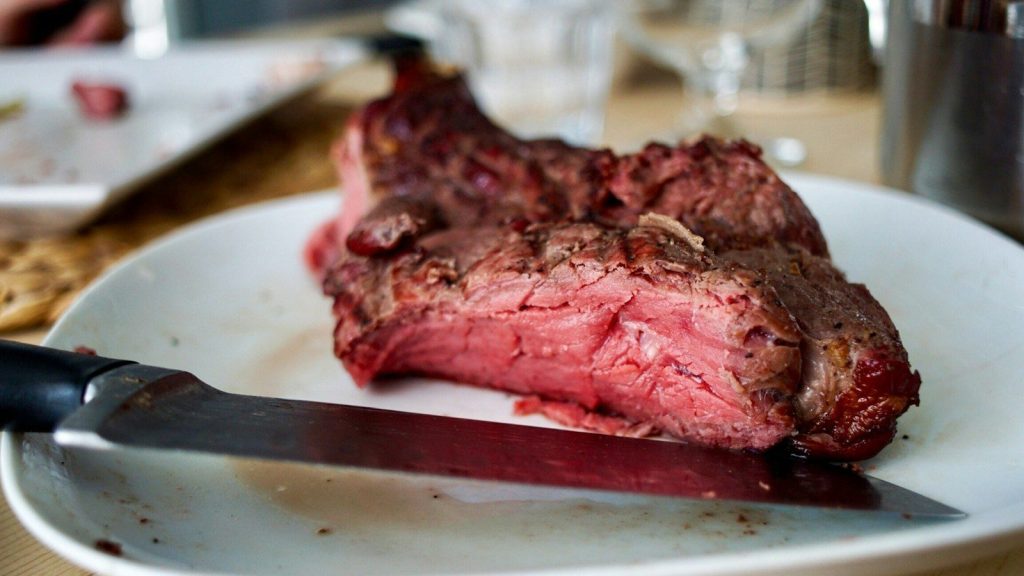 raw meat on white plate